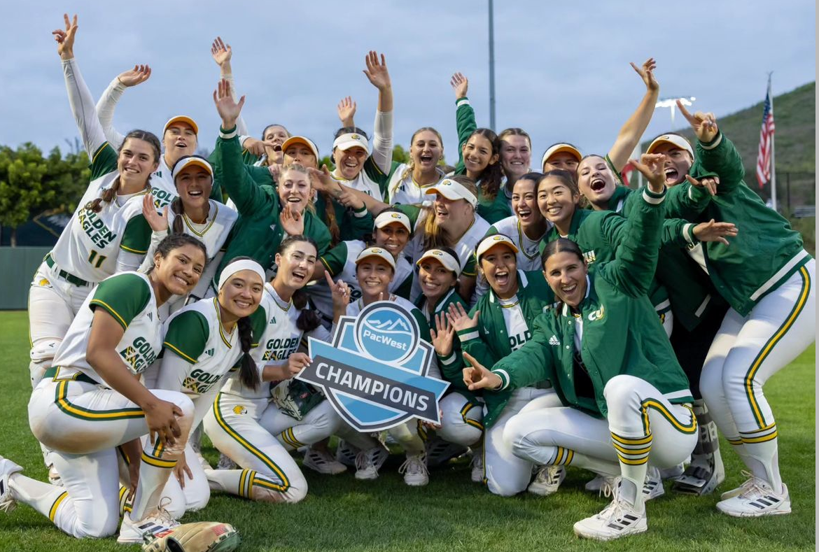 Concordia softball celebrating as newly crowned PacWest Champions.